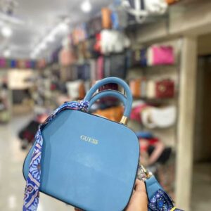 شنطة ازرق سماوي GUESS - جملة اكسبريس