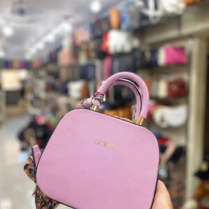 شنطة وردي غامق GUESS - جملة اكسبريس