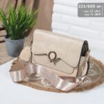 شنطة يد فسدقي أناقة كلاسيكية بلمسة ذهبية