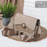 شنطة يد اخضر أناقة كلاسيكية بلمسة ذهبية